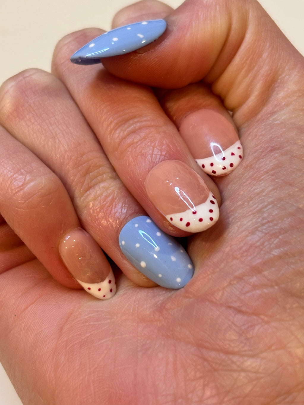 Cute red and blue polkadot nails